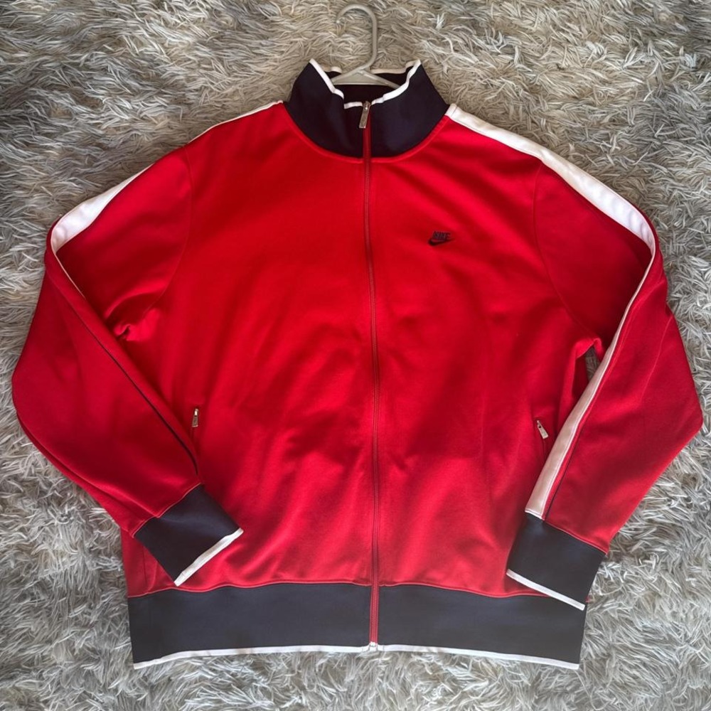 Red and white mens Nike track jacket